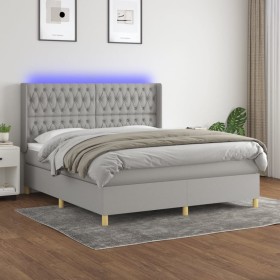 Cama box spring colchón y luces LED tela gris claro 180x200 cm