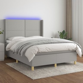 Cama box spring colchón y luces LED tela gris claro 140x190 cm