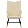 Silla mecedora de tela color crema