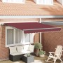 Toldo retráctil automático burdeos 300x250 cm