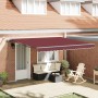 Toldo retráctil automático con luces LED burdeos 400x300 cm