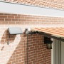 Toldo Retráctil Manual amarillo y naranja 450 x 350 cm tela