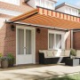 Toldo Retráctil Manual amarillo y naranja 500 x 300 cm tela