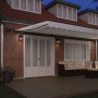 Toldo Retráctil con luces de tiras LED 600 x 300 cm tela