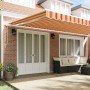 Toldo Retráctil 600 x 350 cm amarillo y naranja
