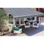 Toldo plegable motorizado 600 cm azul y blanco