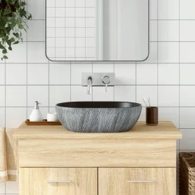 Lavabo sobre encimera ovalado cerámica negro y